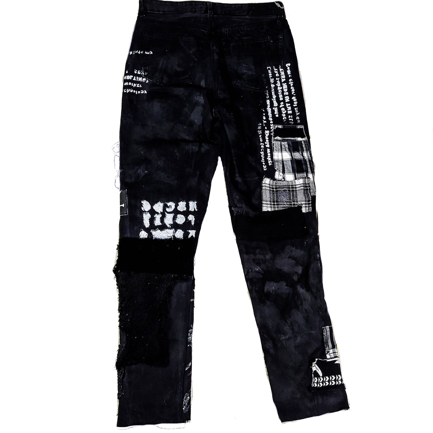 Flat laid black pair with embroideries such as no gods, no masters, prints with punk bands such as exploited, burning britain, sleeping with sirens along with studs, goat with horns, eyelets, laces, zippers, chain, abstract paint and patchwork.