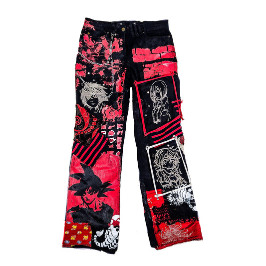 Flat laid pair of pants containing white embroideries with animes and a painted naruto, along with red patchwork, rivets, abstract paint, chains, the overall color scheme being black and red with a bit of white.