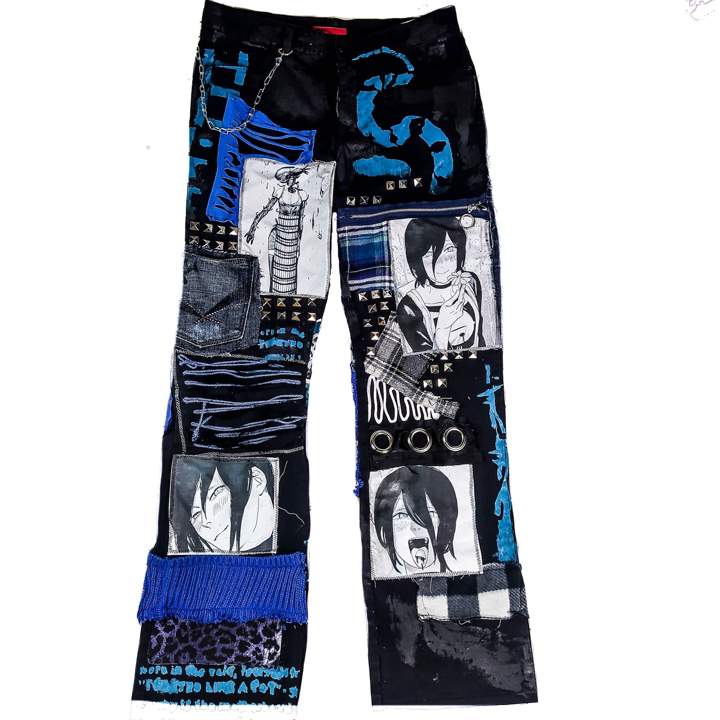 Flat laid black pants with anime prints, colorful patchwork in multiple blue shades, ripped patches, zipper, eyelets, studs and abstract painting with a blue snake on the front.