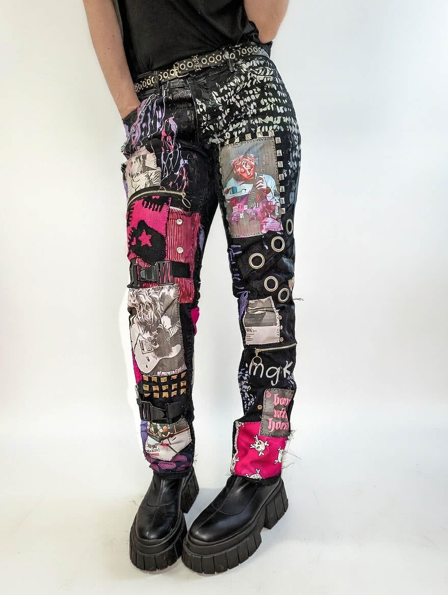 Person wearing a pair of colorful, patchwork-style pants on a white background

Black handmade punk pants with colourful patchwork, studs and MGK-inspired pop-punk aesthetic details